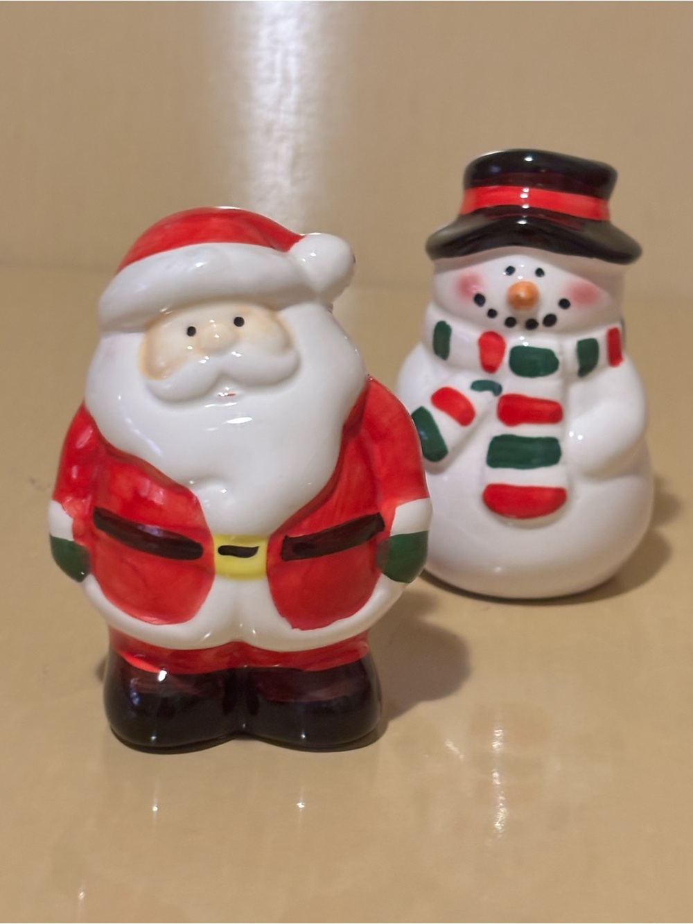 Ceramic Santa and Snowman Salt and Pepper Shakers.